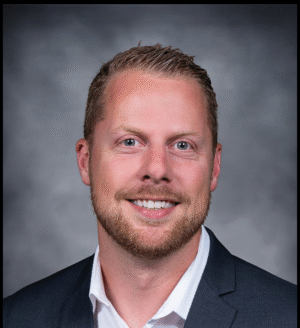 Head shot of man in dark jacket