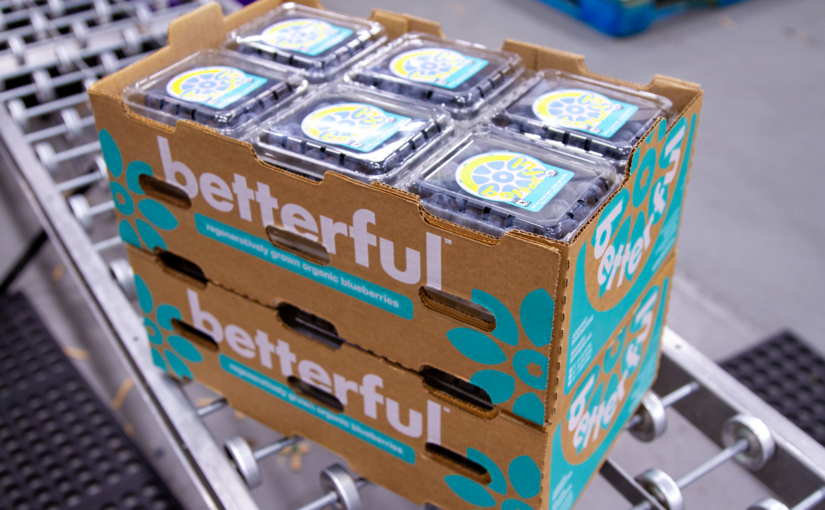 A box of betterful organic bluberries is ready for transport