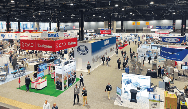 Attendees mill about the EATS show floor