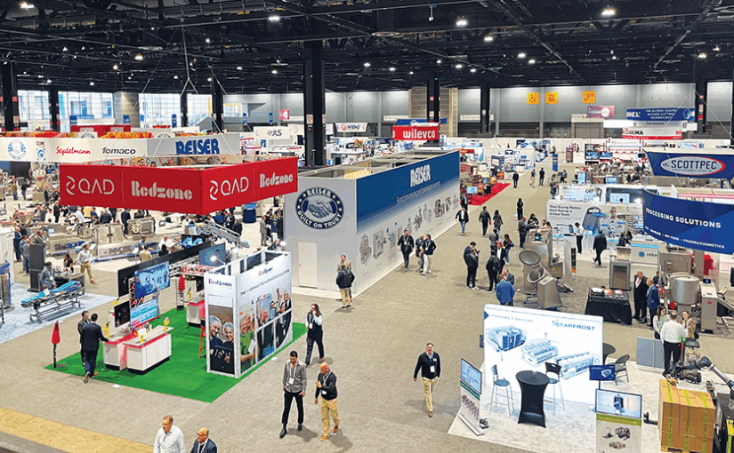 Attendees mill about the EATS show floor