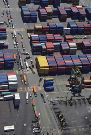 Trucks and containers await cargo at the Port of Oakland