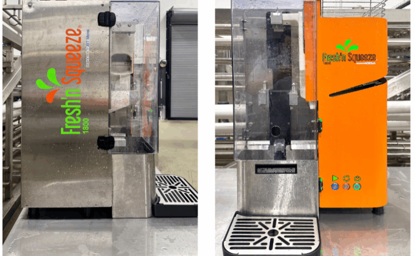 A silver juicer on a countertop