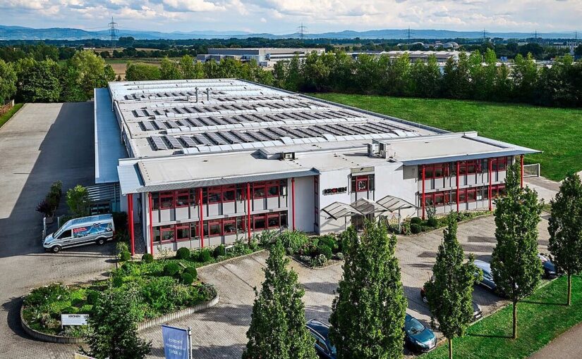 An aerial view of large, bright manufacturing facility