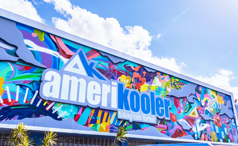 A brightly colored sign with Amerikooler logo