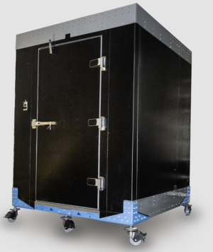 A large, black refrigeration unit on wheels