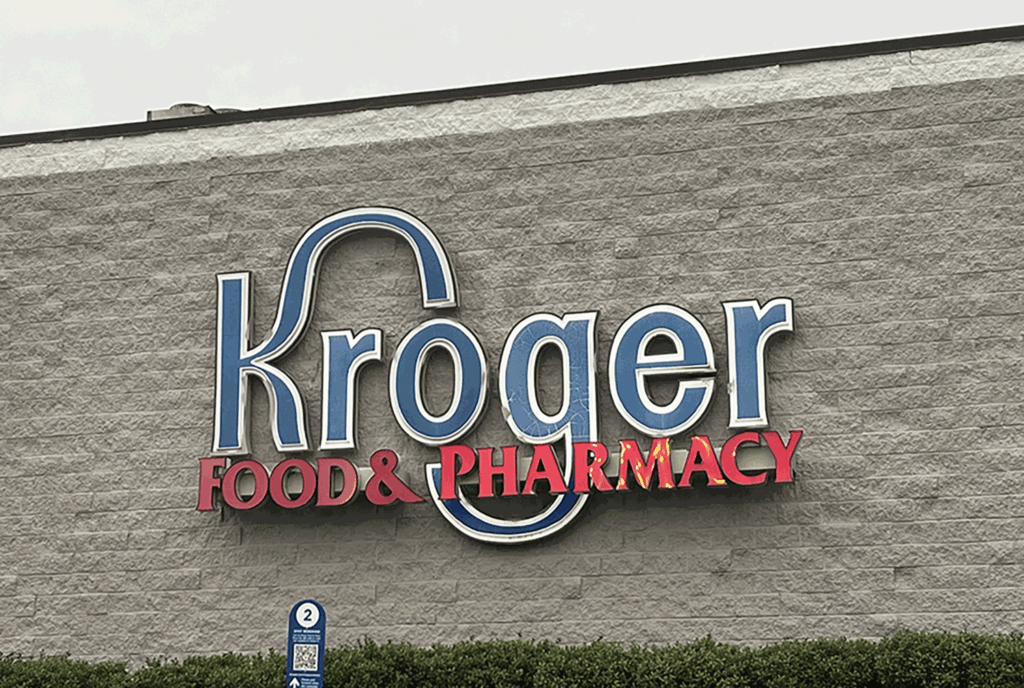 A closeup of the Kroger logo on a supermarket 
