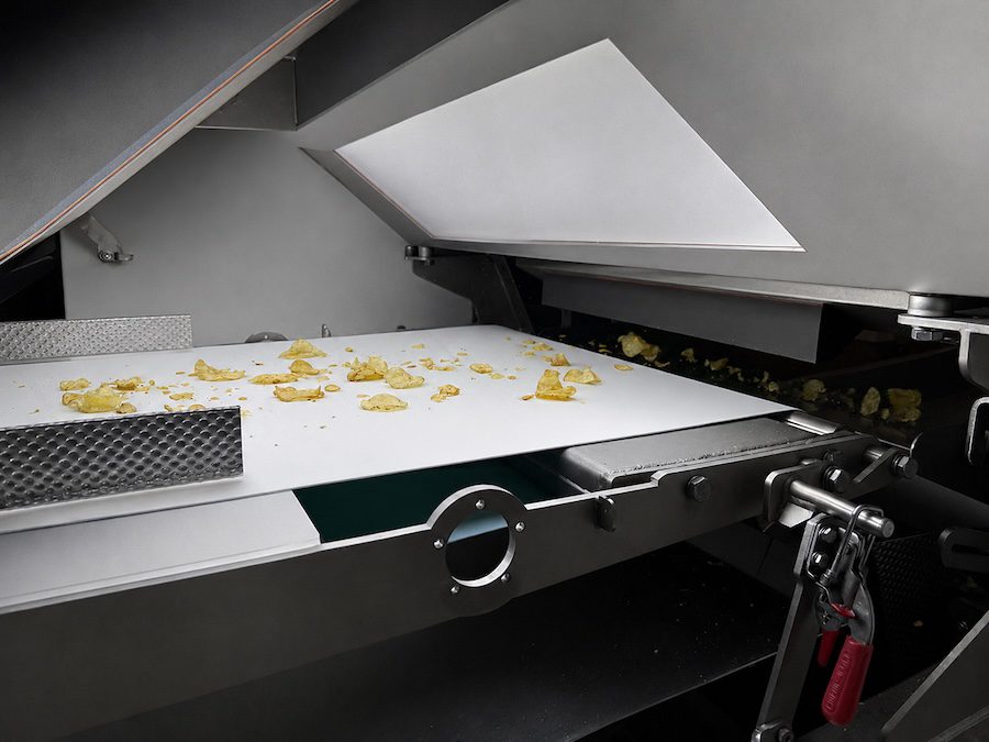 Potato chips pass through sorting equipment 