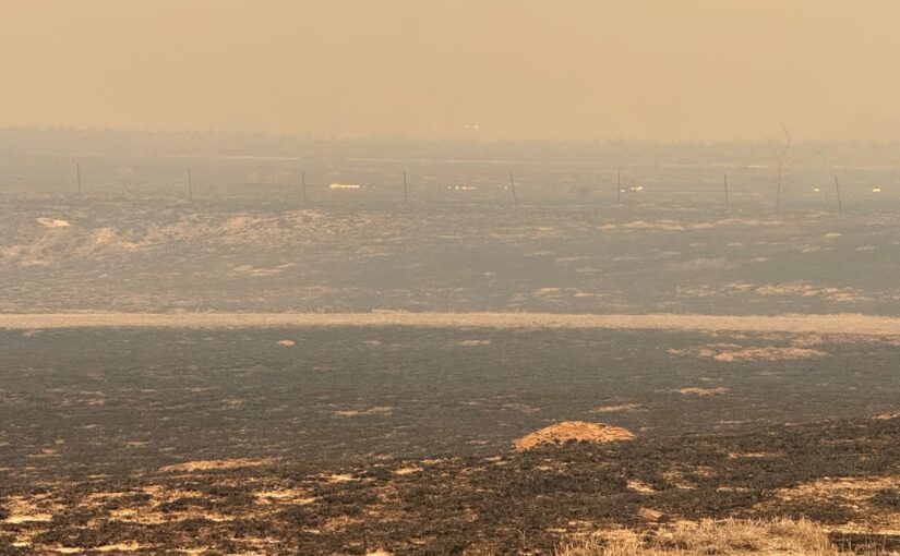 A smoky haze from wildfires hangs over a Texas town
